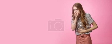 Photo for Portrait intense girl feel bad after party alcohol intoxication touching stomach cover mouth widen eyes suffering stomach disorder, puke, vomit, suffering belly discomfort pink background. - Royalty Free Image