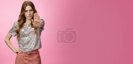 Photo for No means never. Portrait confident serious-looking strong european woman wearing glamour outfit look under forehead restrain prohibiting, demanding stop using fur, standing pink background. - Royalty Free Image