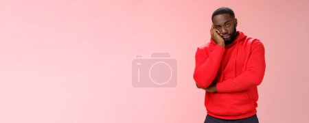 Photo for Bored annoyed african-american guy look sceptical dying boredom cannot wait go home lean head palm raise eyebrow judgemental ignorant, standing bothered irritated pink background. - Royalty Free Image