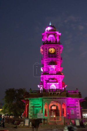 Photo for Jodhpur, Rajasthan, India - 19.10.2019 : Blue hour image of famous Sardar Market and Ghanta ghar Clock tower in Jodhpur, Rajasthan, India. - Royalty Free Image