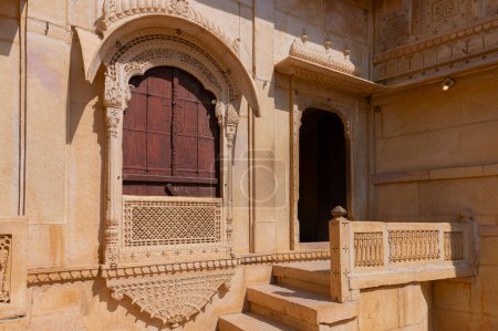 Photo for Sandstone made beautiful balcony, jharokha, stone window and exterior of Rani Mahal or Rani Ka Mahal, inside Jaisalmer fort. Rajasthan, India. UNESCO World heritage site - Royalty Free Image