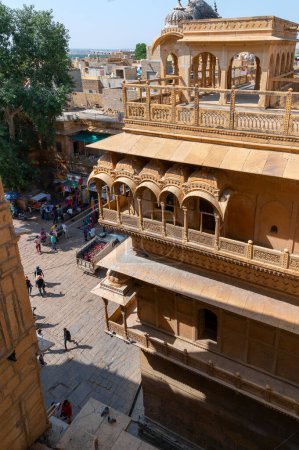 Photo for Jaisalmer, Rajasthan, India - 15th October 2019 : Sandstone made beautiful balcony, jharokha, stone window and exterior of Rani Mahal or Rani Ka Mahal, inside Jaisalmer fort. - Royalty Free Image