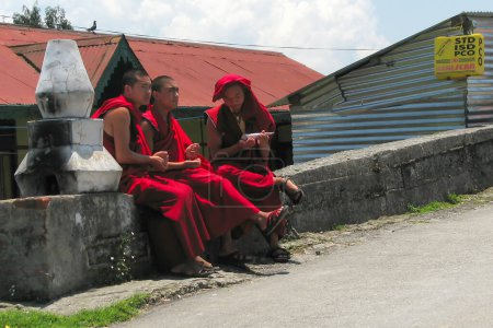 Photo for Gangtok, Sikkim, India - 9th May 2008 : Monks chatting at Rumtek Monastery, Dharma Chakra Centre, is a gompa and seat-in-exile of the Gyalwang Karmapa, Sikkim, India. - Royalty Free Image