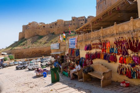 Photo for Jaislamer fort, Rajasthan, India - 13.10.2019 : Traditional King and queen, called Raja Rani, handmade puppets or Katputli Sets are hanging from wall. Dolls in Jaisalmer are popular, sold to tourists. - Royalty Free Image