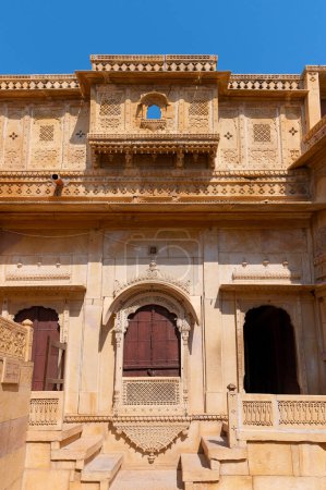 Photo for Jaisalmer fort, Rajasthan, India - 15.10.2019 : Sandstone made beautiful balcony, jharokha, stone window and exterior of Rani Mahal or Rani Ka Mahal, inside fort. - Royalty Free Image