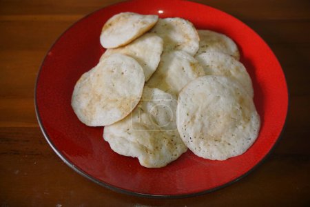 Photo for "Serabi", "surabi" is a traditional pancake-like food originating from Indonesia. Serabi made from rice flour has two flavors, namely sweet and salty. - Royalty Free Image