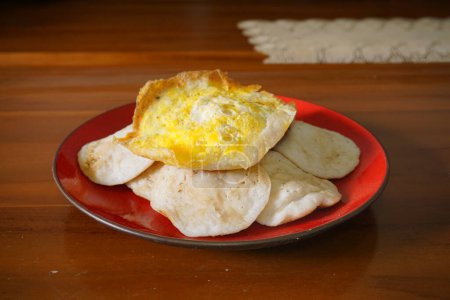 Photo for "Serabi", "surabi" is a traditional pancake-like food originating from Indonesia. Serabi made from rice flour has two flavors, namely sweet and salty. - Royalty Free Image