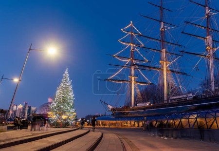 Photo for The famous Cutty Sark ship illuminated in Christmas lights, in Greenwich peninsula, London - Royalty Free Image
