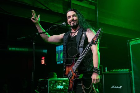 Photo for The Lion Within performs as special guest of Saving Abel at District 142 in Wyandotte, Michigan on 7-05-23 - Royalty Free Image