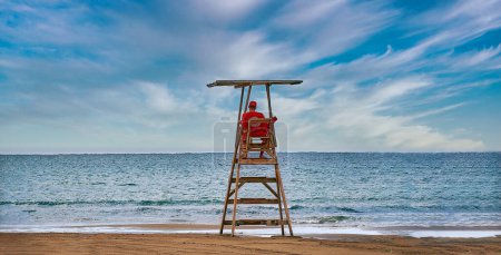 Photo for Man on the beach with the sea - Royalty Free Image