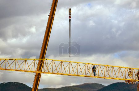 Photo for Dismantling of a large construction crane. - Royalty Free Image