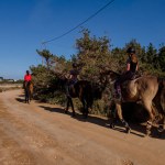 horsemen traveling a green route next to the Estany des Peix, Formentera, Pitiusas Islands, Balearic Community, Spain