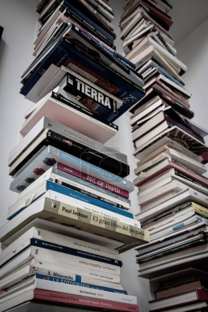 Foto de Books piled up on a shelf, Mallorca, Balearic Islands, Spain - Imagen libre de derechos