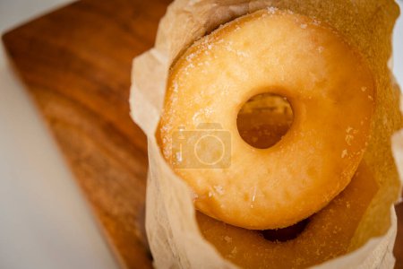 Photo for Paper bag full of donut - Royalty Free Image