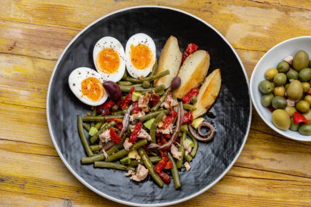 Photo for Nizarda salad green beans and dried tomatoes, Spain - Royalty Free Image