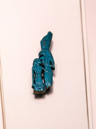 Photo for Plaque with a lioness-headed goddess nursing a king, Blue Faience, Third Intermediate Period, Egypt,collection of the British Museum - Royalty Free Image
