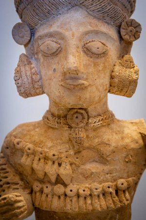 Photo for Female statuette, from Ibiza, clay, 4th cent. BCE, Madrid museo arqueologico nacional, The Coliseum ,   Rome, Lazio, Italy , - Royalty Free Image