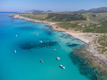 Photo for Pleasure boats at anchor , S'Arenalet d'Albarca beach, protected natural area, capdepera, Mallorca, Balearic Islands, Spain - Royalty Free Image