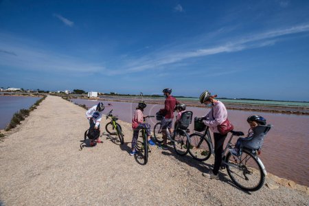 Photo for Family bike ride, La Savina, Formentera, Pitiusas Islands, Balearic Community, Spain - Royalty Free Image