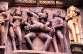 Erotic relief in the temple Devi Jagadambi(s.X-XI). Khajuraho.Madhya Pradesh. India. Asia. Stickers #667346772