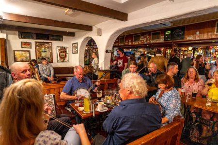 Photo for Celtic musical group in a Pub, Doolin, County Clare, Ireland, United Kingdom - Royalty Free Image