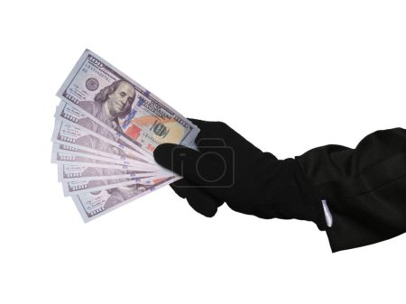 Foto de A picture of suspicious hand appear from giving fake money. Loan shark and financial assist. - Imagen libre de derechos