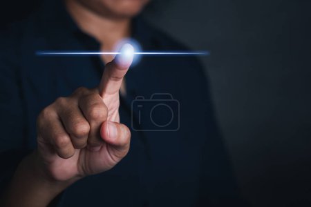 Businessman using finger touching on virtual screen. Futuristic business and IT presentation background. Space for text. Innovation technology computer and business concept.