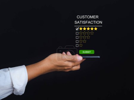 Photo for Customer experience, feedback, service evaluation, and satisfaction conceptual. People using a mobile phone to giving feedback via the internet. Positive review. Client satisfaction surveys. - Royalty Free Image