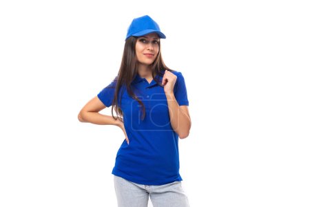 young caucasian brunette woman in blank blue t-shirt and cap.