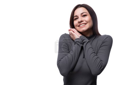 Photo for Happy young stylish woman with black hair smiling on white background. - Royalty Free Image