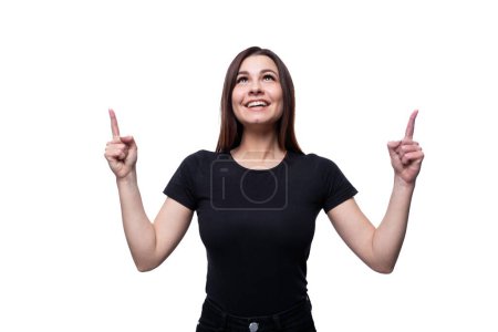 Photo for Young slim brunette woman inspired by an idea and holding a thumbs up. - Royalty Free Image