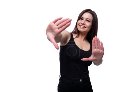 Photo for Casual young brunette woman actively gesturing. - Royalty Free Image