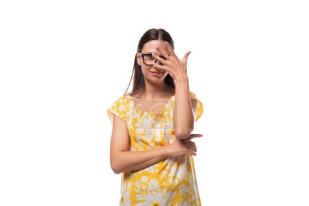 young European woman with glasses thinking about solving a problem.