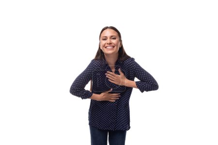young happy cute caucasian brunette lady dressed in a dark blue shirt on a white background.
