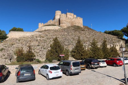 Photo for Biar, Alicante, Spain, January 14, 2023: Parking in the Arab Castle of Almohad origin from the XII century in Biar, Alicante, Spain - Royalty Free Image
