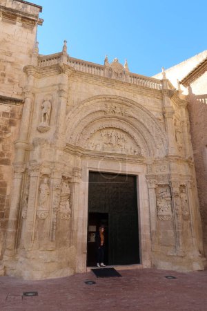Photo for Biar, Alicante, Spain, January 14, 2023: Main entrance door of the church of Our Lady of the Assumption of Biar, Alicante, Spain - Royalty Free Image