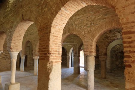 Photo for Almonaster la Real, Huelva, Spain, June 21, 2023: Interior arches of the haram or prayer room of the X century mosque of Almonaster la Real. Huelva, Spain - Royalty Free Image