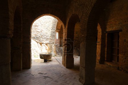 Photo for Almonaster la Real, Huelva, Spain, June 21, 2023: Sahn or courtyard of ablutions from the interior of the 10th century mosque of Almonaster la Real. Huelva, Spain - Royalty Free Image