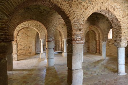 Photo for Almonaster la Real, Huelva, Spain, June 21, 2023: Brick arches and stone columns of the 10th century mosque of Almonaster la Real. Huelva, Spain - Royalty Free Image