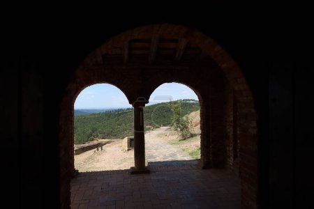 Photo for Almonaster la Real, Huelva, Spain, June 21, 2023: Arches of the west portico from inside the X century mosque of Almonaster la Real. Huelva, Spain - Royalty Free Image