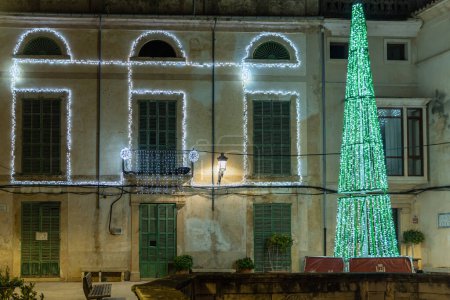 Photo for Felanitx, Spain; december 10 2022: Christmas tree illuminated at night, in the Majorcan town of Felanitx, Spain - Royalty Free Image