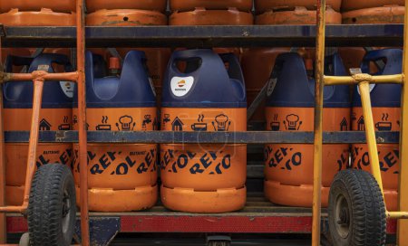 Photo for Palma de Mallorca, Spain; january 12 2024: Delivery and sales truck of butane gas cylinders of the Spanish multinational company Repsol, parked in a neighborhood of Palma de Mallorca, Spain - Royalty Free Image