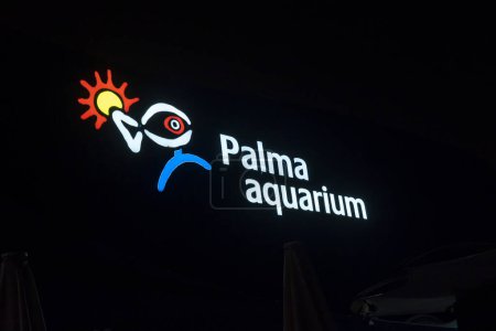 Photo for Palma de Mallorca, Spain; march 29 2024: Illuminated sign of the company Palma Aquarium at night, island of Mallorca, Spain - Royalty Free Image