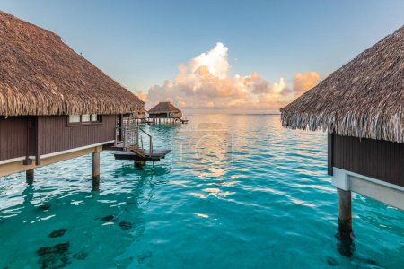 Photo for Luxury overwater bungalows in tropical lagoon of Moorea Island. - Royalty Free Image