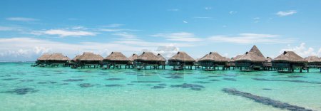 Photo for Luxury overwater bungalows in lagoon of Moorea Island, French Polynesia. - Royalty Free Image