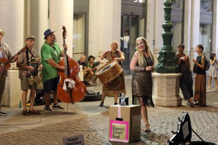 Photo for Ferrara, Italia - August 26, 2022: The Ferrara Buskers Festival is dedicated to the art of the street. Roamin Street Band performs street music in New Orleans style with his own personal touch. - Royalty Free Image
