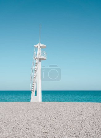 Photo for Lifeguard tower on a beautiful pebble beach in Albir (Alicante, Spain). Shingle beach on a sunny day. Paradise beach with white pebbles and turquoise waters - Royalty Free Image