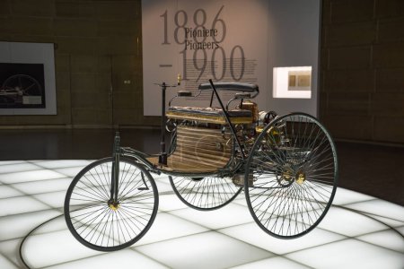 Photo for Stuttgart, Germany - December 13, 2017: Mercedes-Benz Museum - Karl Benzs first three-wheeled self-propelled car with a gasoline engine on January 29, 1886. - Royalty Free Image