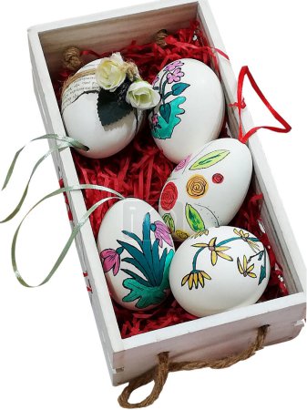 Easter eggs painted in spring in a wooden box