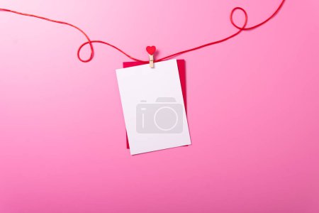 Photo for Envelope pink background rose valentines day celebrate holiday top angle top view mockup red heart - Royalty Free Image
